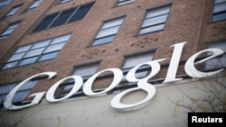 The Google signage is seen at the company's headquarters in New York January 8, 2013. Google Inc and a New York redevelopment organisation are providing a Manhattan neighbourhood with free public WiFi Internet access, making it the largest area of coverag