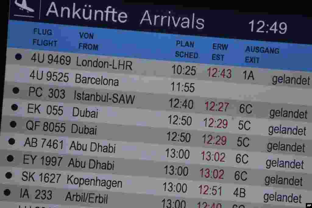 The arrivals board shows Flight 4U 9525 from Barcelona without a status advisory at the airport after a Germanwings passenger jet carrying more than 140 people crashed in the French Alps region, in Duesseldorf, Germany, March 24, 2015.